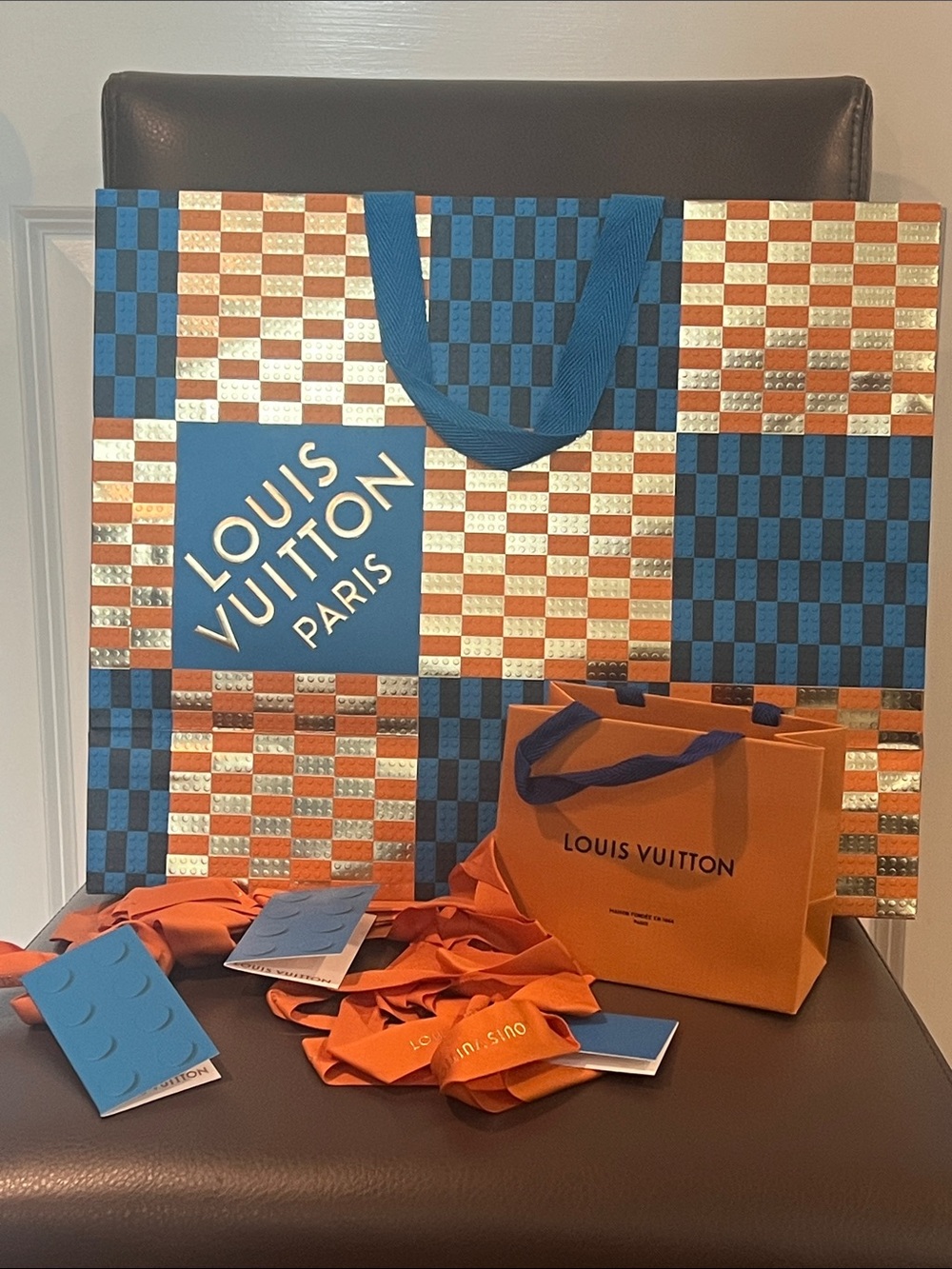 Louis Vuitton bag, ribbons, gift tags